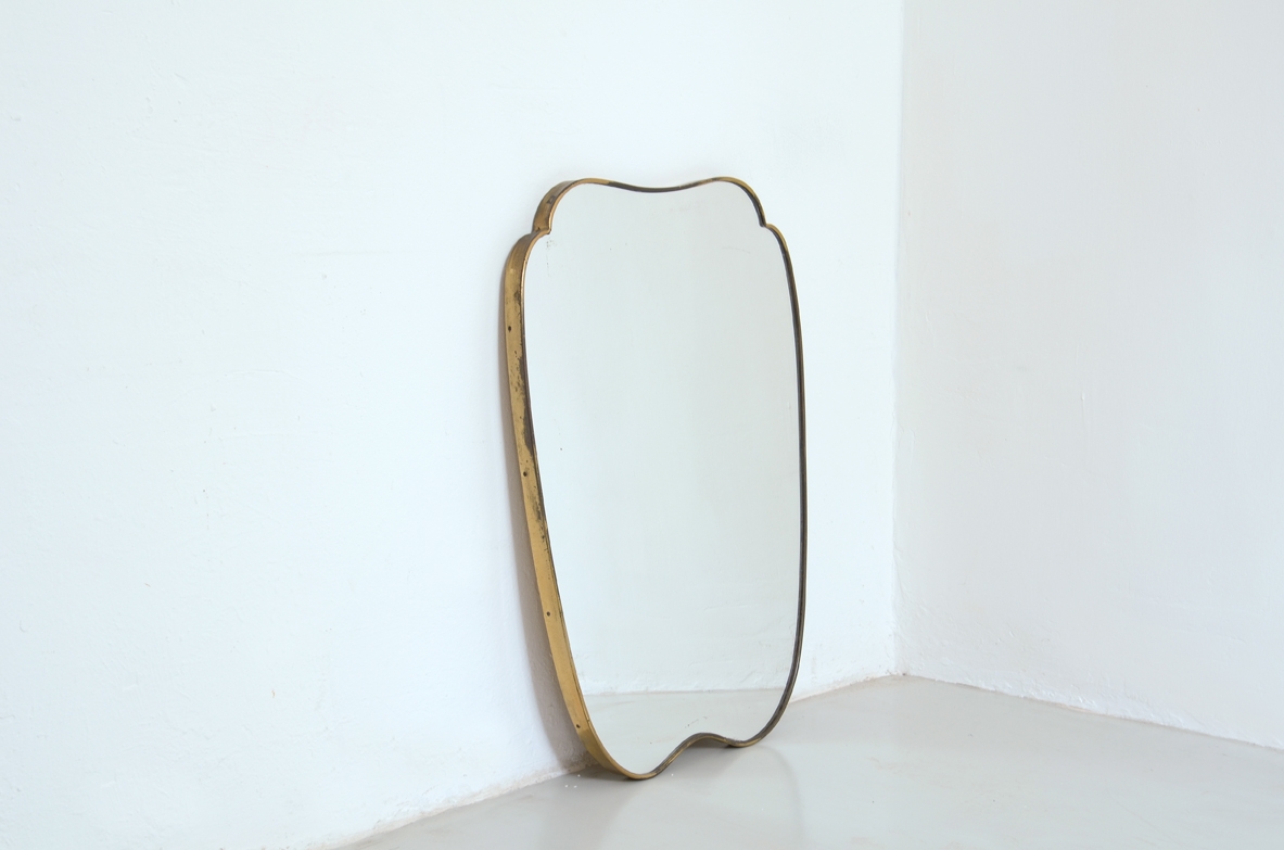 Italian 1950's mirror with brass frame.