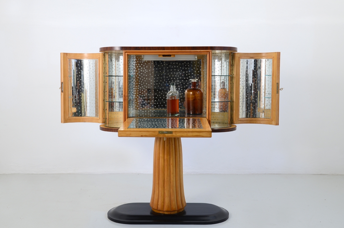 Bar cabinet based on a central column, Italy 1940's.