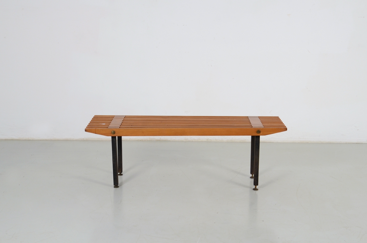 Bench in teak wood with lacquered metal supports, Italy'1960ca.