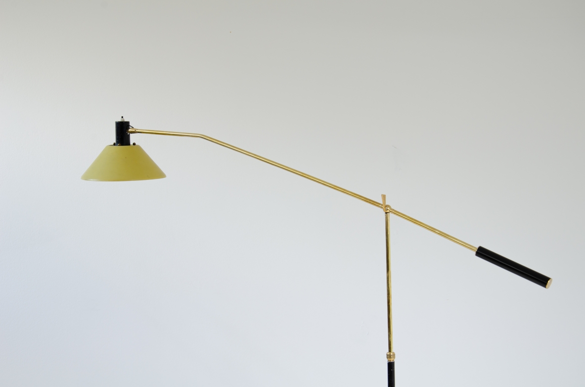 Stilux, reading adjustable light, with a yellow metal shade and marble base. Italy, 1950's.