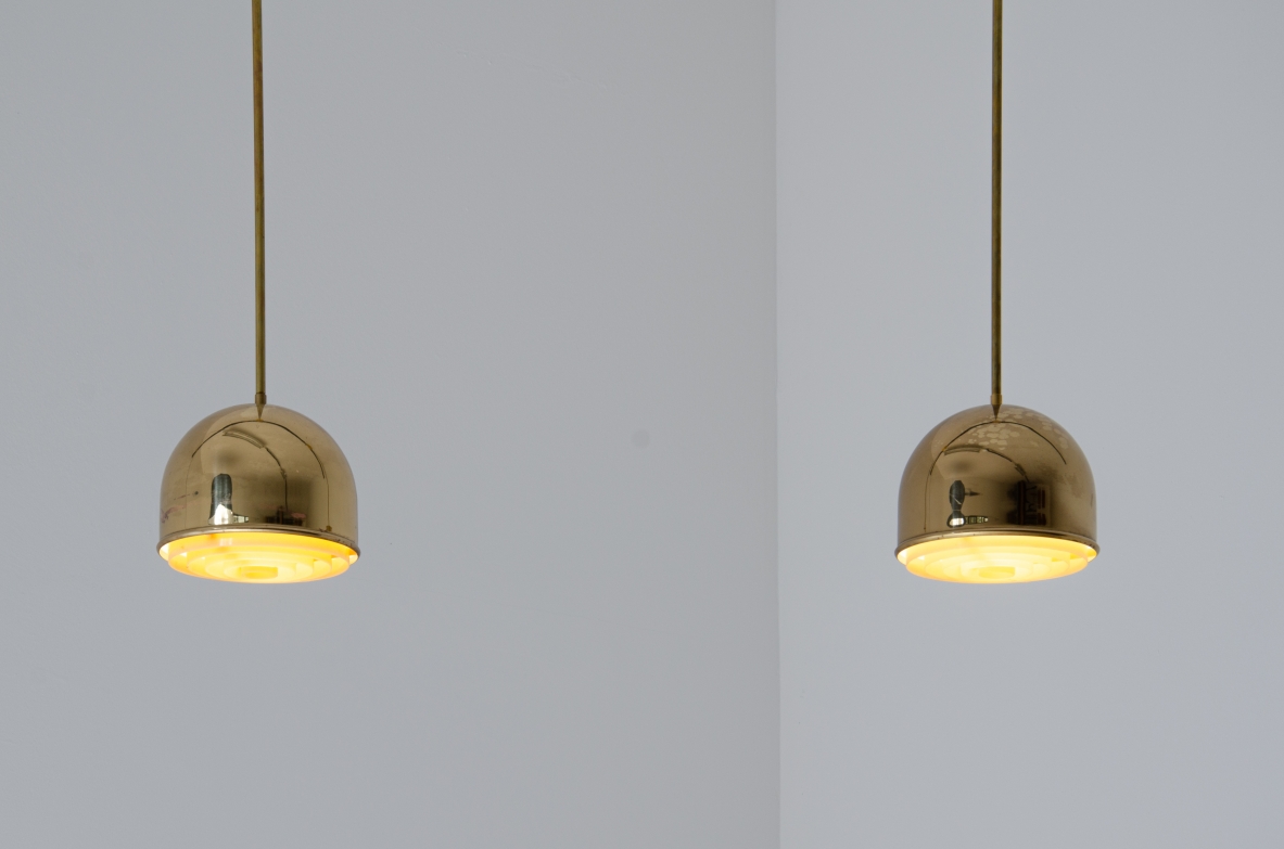 Pair of Swedish pendant lamps in brass. Produced by Bergboms, Sweden, 1960's.