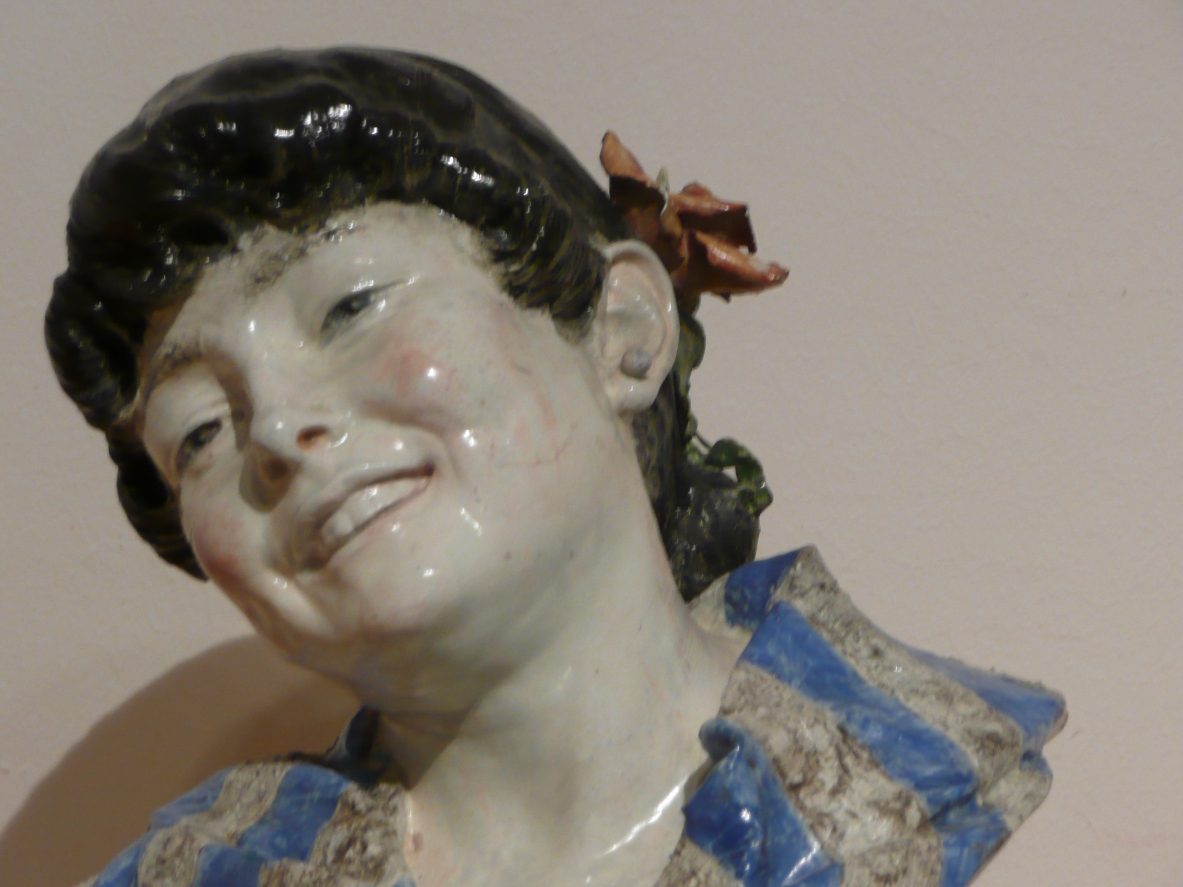 Painted ceramic figure of a young woman.  Francesco Parente, Florence 1940ca.  Signature on the back.