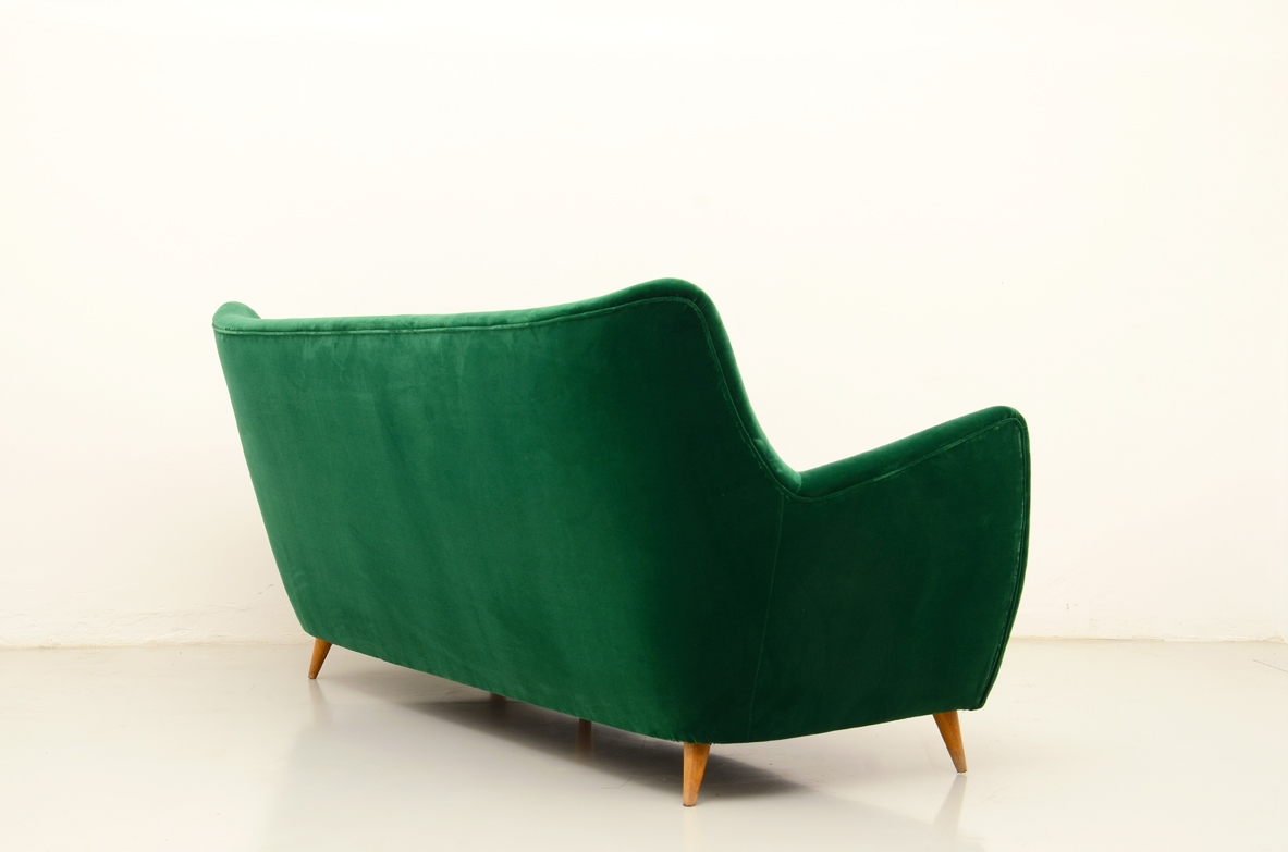 Elegant Italian 1950's set of armchars and sofa with a splendid green velvet upholstery.