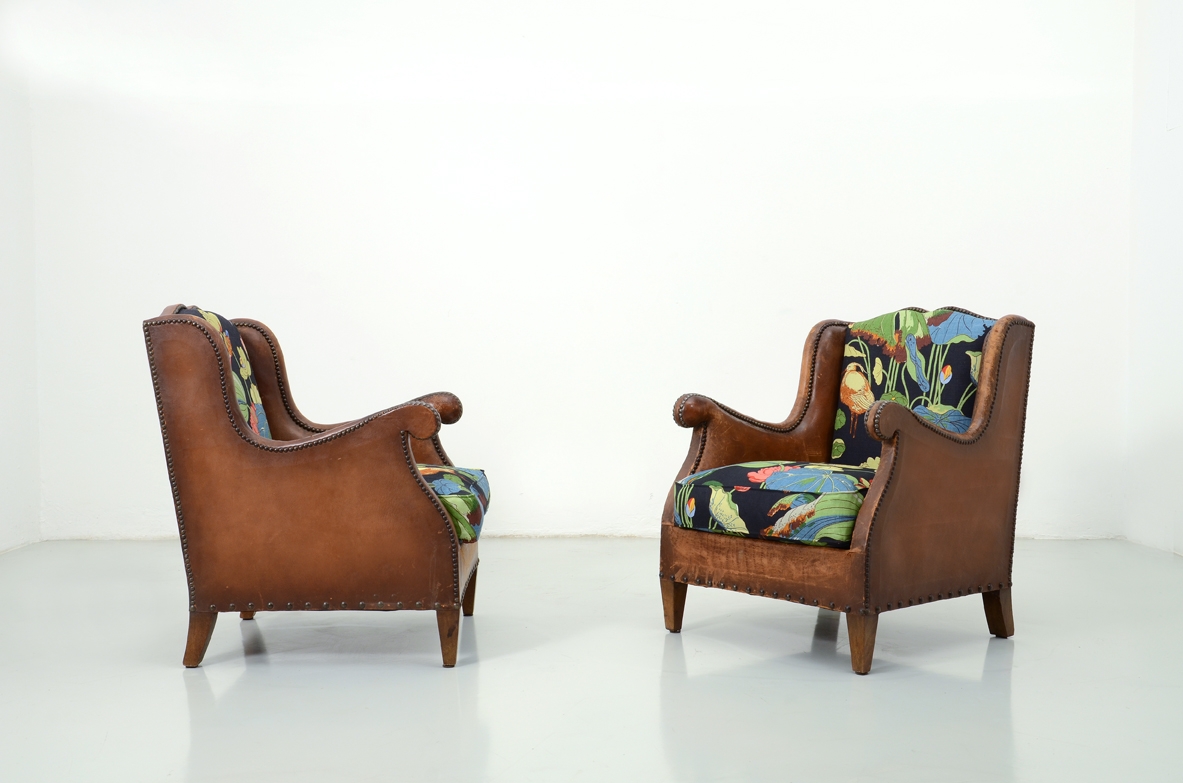 Pair of 1930's club armchairs.