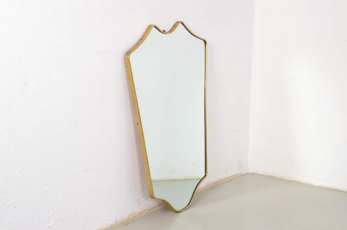 1950's Italian mirror with brass frame.