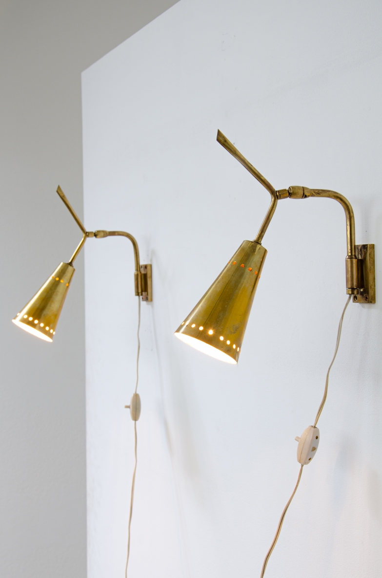 Pair of sconces clamp with perforated brass cones, 1950ca.