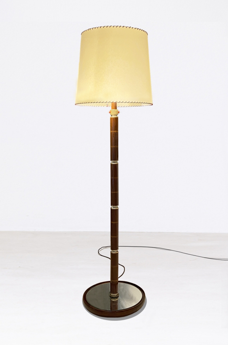 Large floor lamp with wooden stem and parchment lampshade, 1940s.