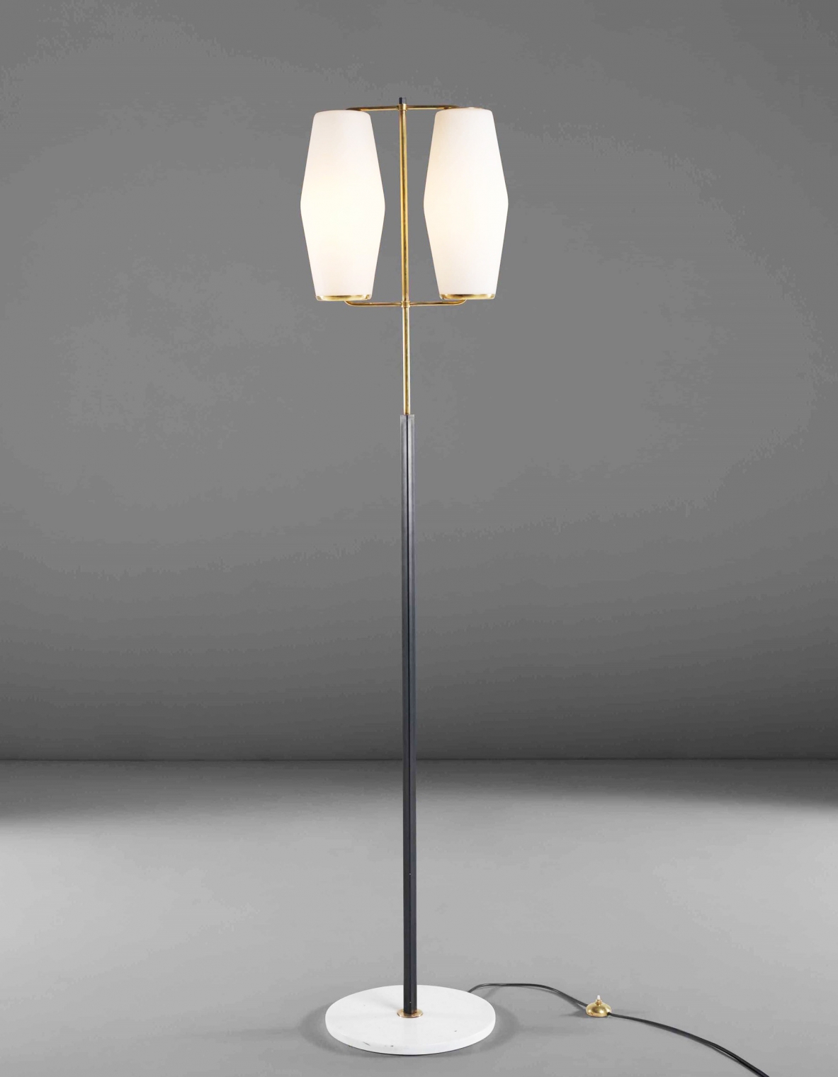 Stilnovo, 1950's floor lamp with brass and lacquered metal structure, marble base and opal glass diffusers. 