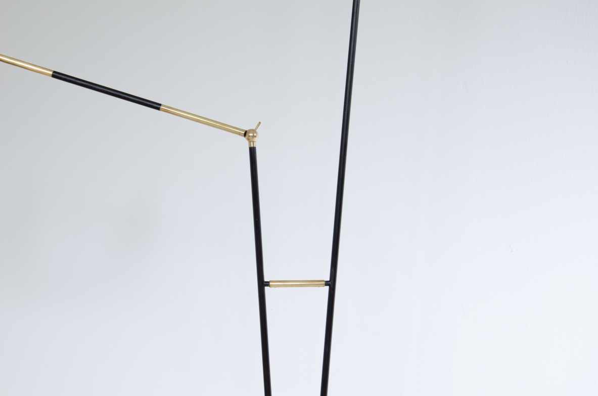 Stilux Milano, 1950's floor lamp in metal and brass with two stems one of which is adjustable. Lamp shades in painted metal and nice marble base.