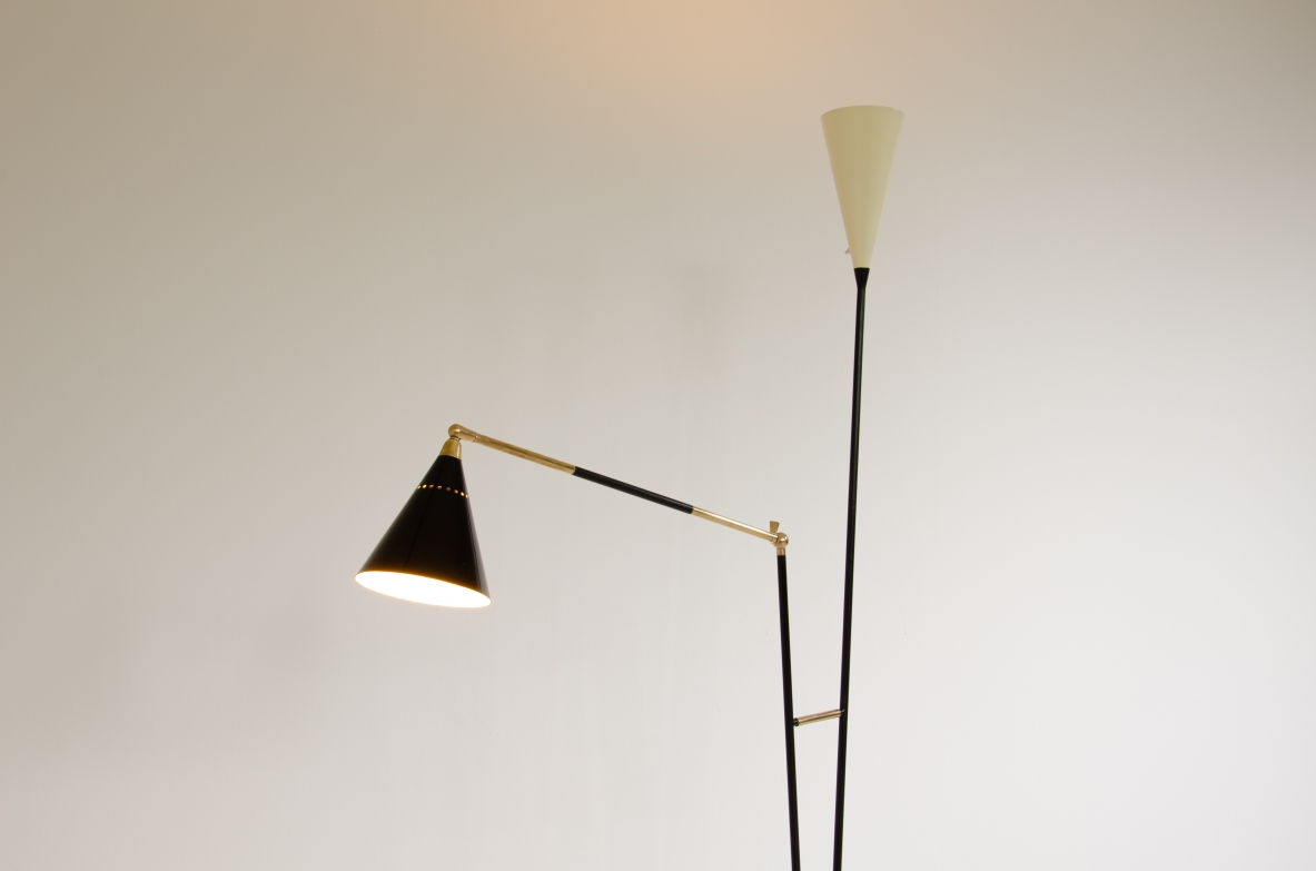 Stilux, lampada da terra in metallo e ottone a  due bracci di cui uno regolabile. Paralumi in metallo verniciato, Milano,1950ca.