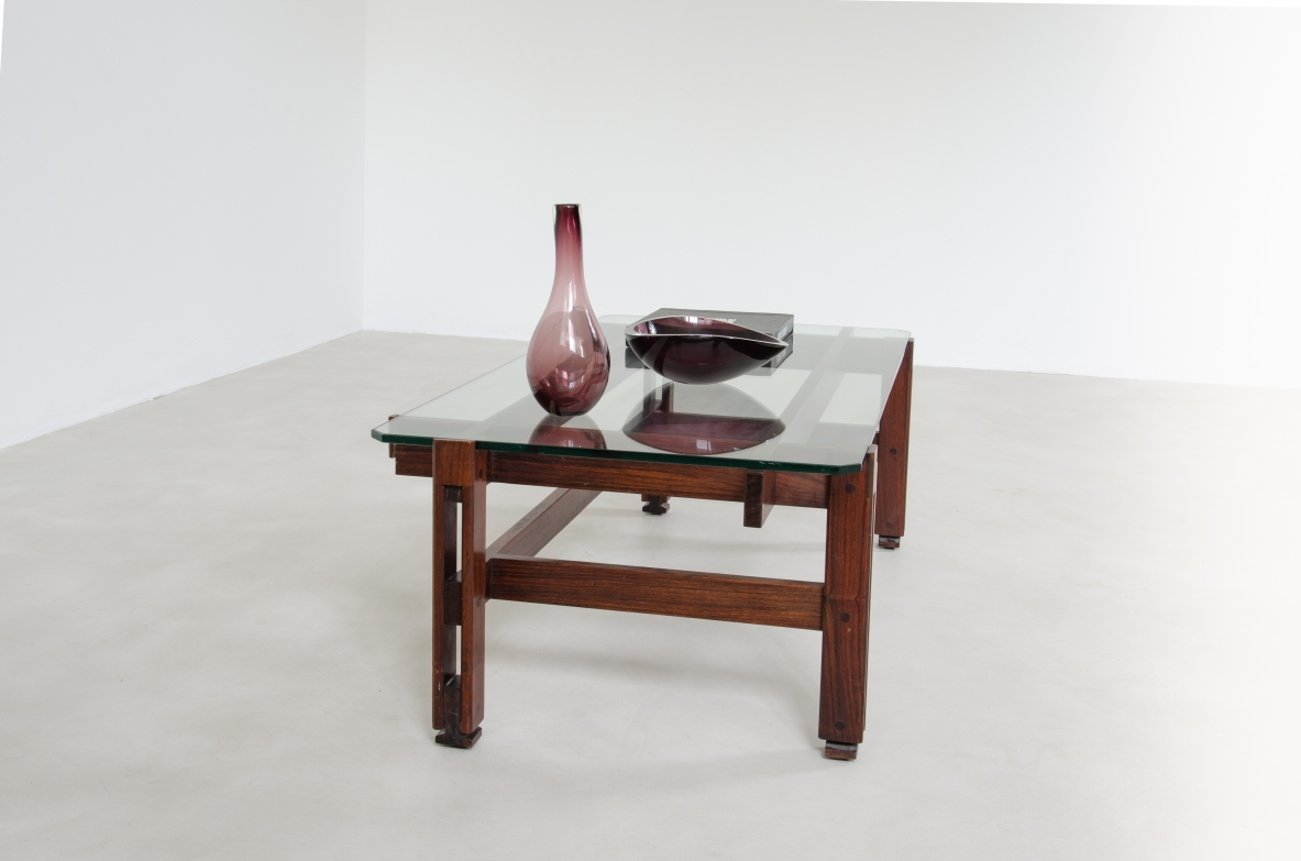 Ico Parisi, low table with asymmetrical wood structure in rosewood and a thick crystal glass top. Prod. Cassina 1962.