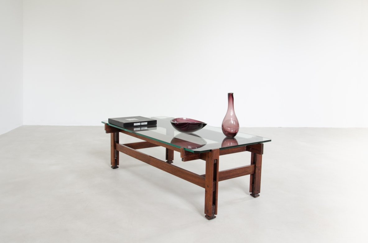 Ico Parisi, low table with asymmetrical wood structure in rosewood and a thick crystal glass top. Prod. Cassina 1962.