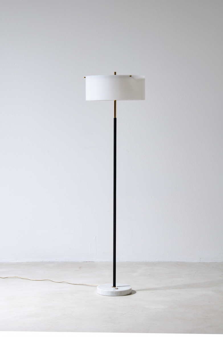 Tito Agnoli, metal and brass floor lamp with marble base and black and white methacrylate hat.  Produced by Oluce 1955.
