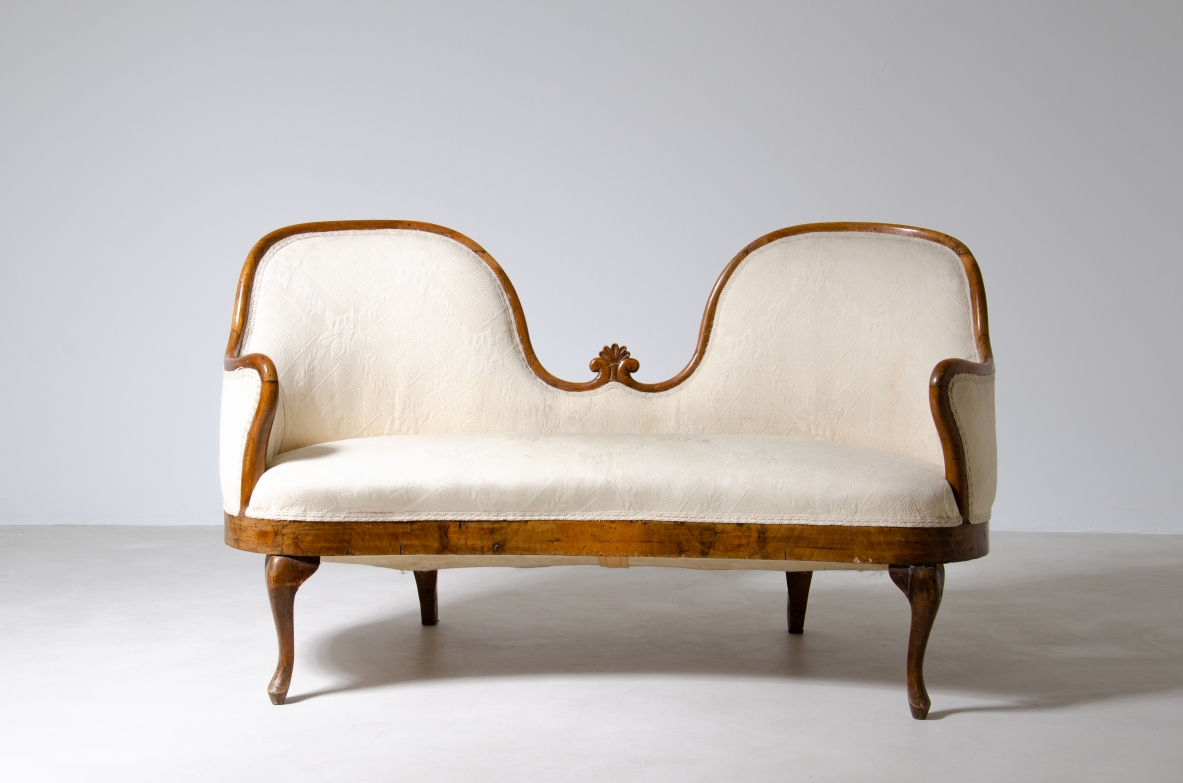 Elegant two-seater sofa in wood and fabric.  Italy, epoque Charles X, around 1830.