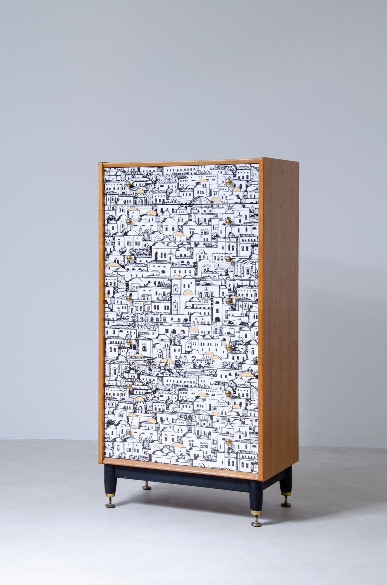 Piero Fornasetti, small cabinet with drawers with front decorated with Middle Eastern architectural patterns. Wooden base with brass tips and ash sides.  Signed Piero Fornasetti, 1950's.