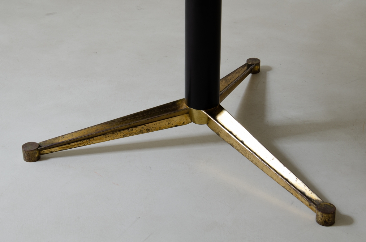 Melchiorre Bega, black lacquered wooden table with three-spoke shaped brass base.  Manufacture Bega & C. Bologna, Italy 1950s.