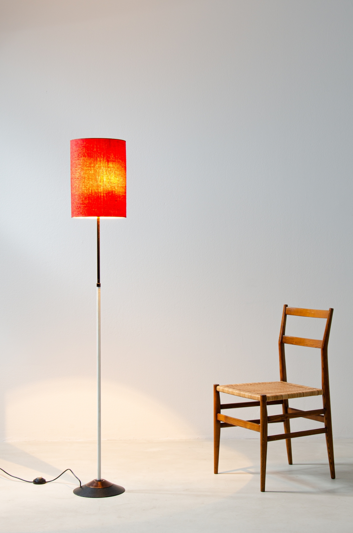 Stilnovo, floor lamp in anodized and painted metal with fabric lampshade.  Model 4072.1950s.  Original manufacturer label. 