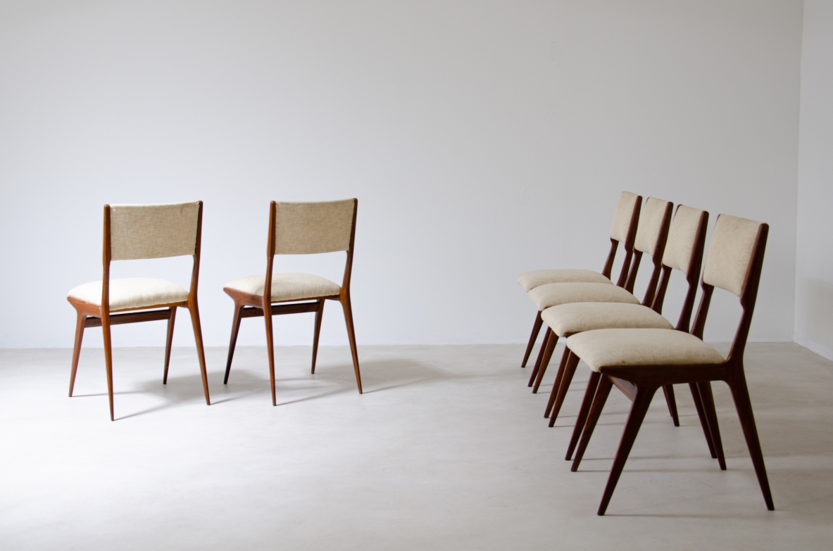 Carlo de Carli (1910 - 1999)  Set di sei sedie Modello 158 con seduta e schienale imbottiti.  Prod. Cassina, 1953-1954