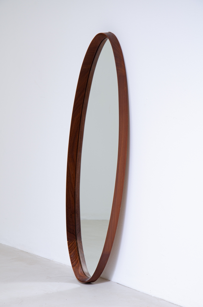 Elliptical shaped mirror in teak. Denmark, 1960s