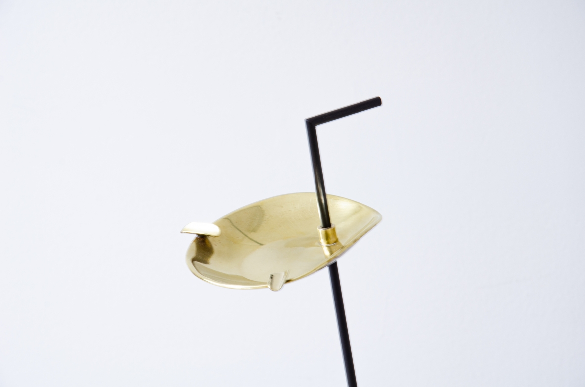 Stand ashtray with black painted steel rod and brass details.  Italian manufacture, 1950's.