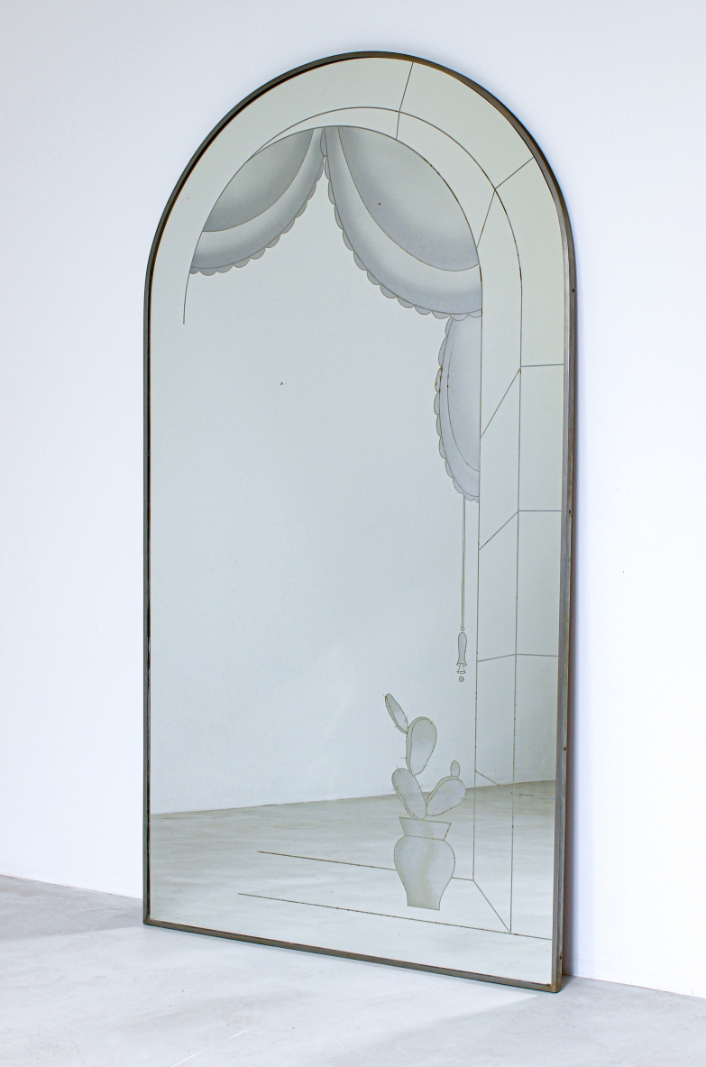 Large arched mirror with architectural design.  Italian manufacture around 1940.