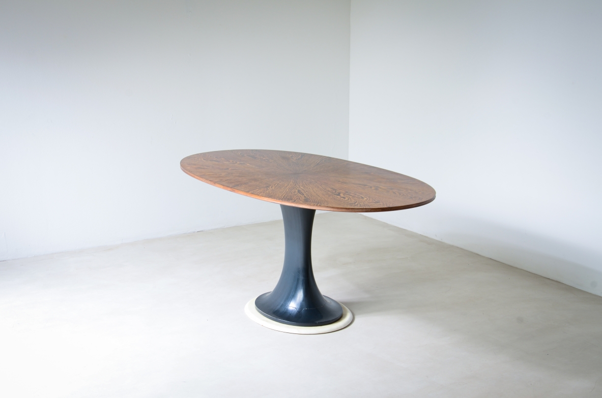 Elegant oval table with turned base in petrol blue lacquered wood and marble disc.  Palm wood veneer top.  Turin School, 1960's.