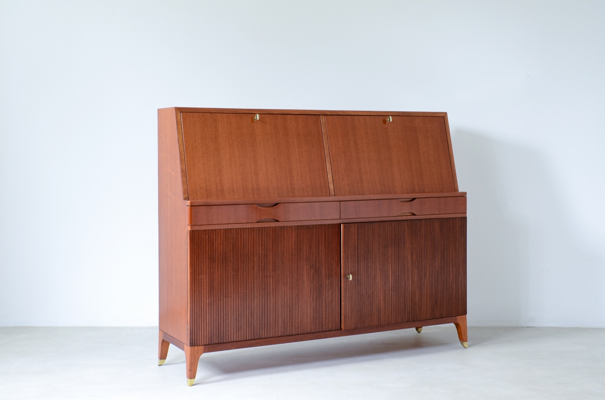 Storage unit with front in grinded wood and two drop-down shelves with interiors in blond maple and a ground glass top.  Two drawers and elegant feet with brass tips.  Italian manufacture, 1940's