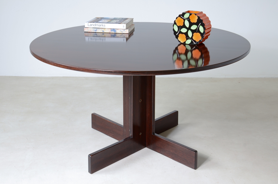 Rosewood table with helix base, brass details.  Italian manufacture, 1970's.