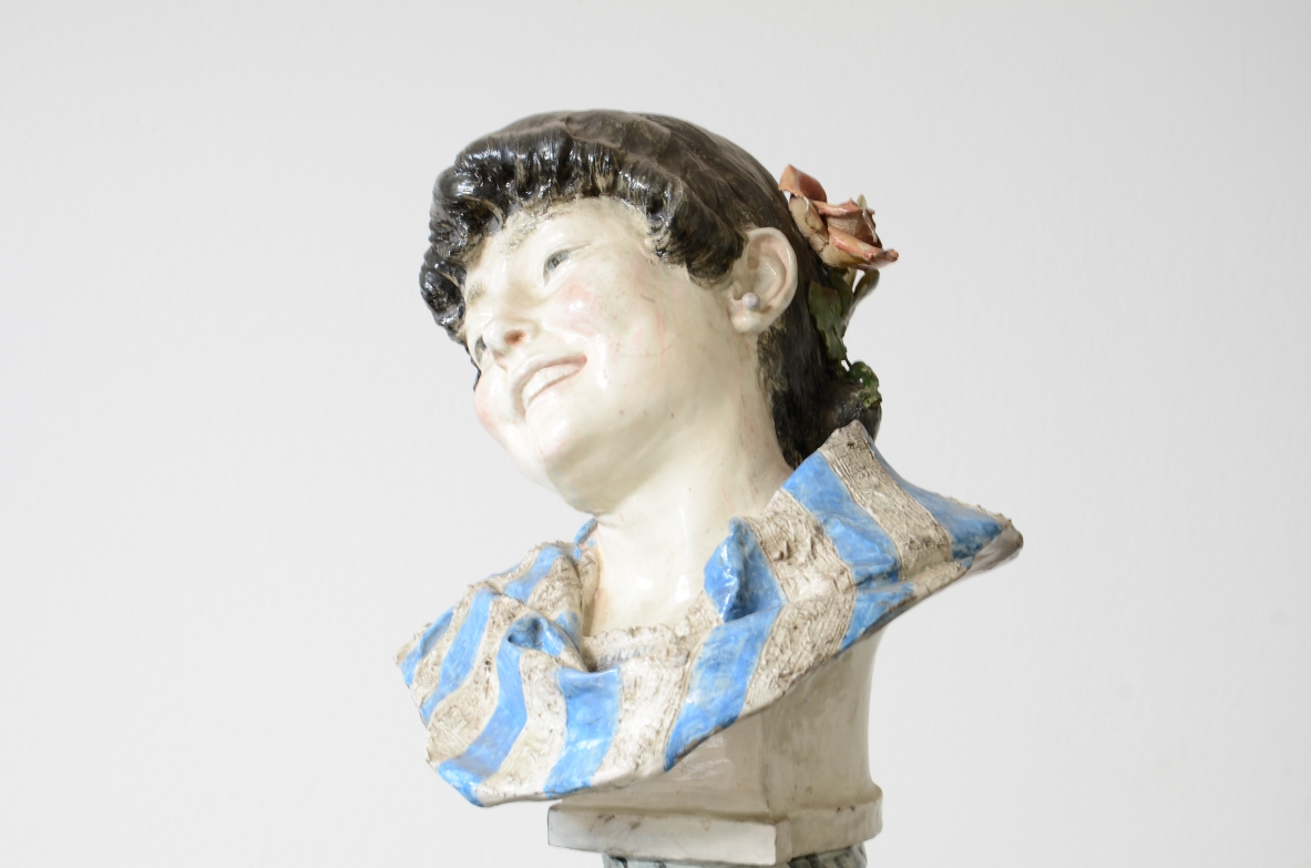 Painted ceramic figure of a young woman.  Francesco Parente, Florence 1940ca.  Signature on the back.