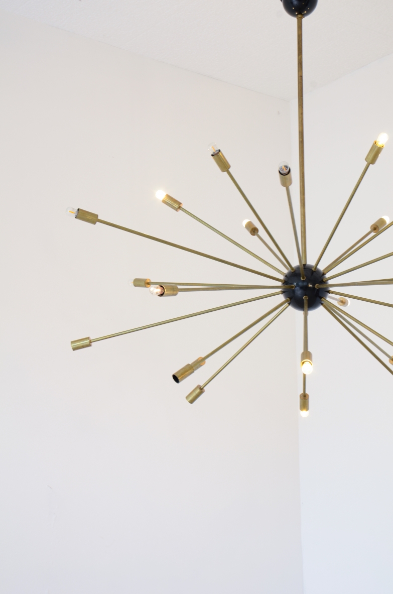 Large Sputnik model chandelier with 24 lights, brass and painted metal.  Italian manufacturing.