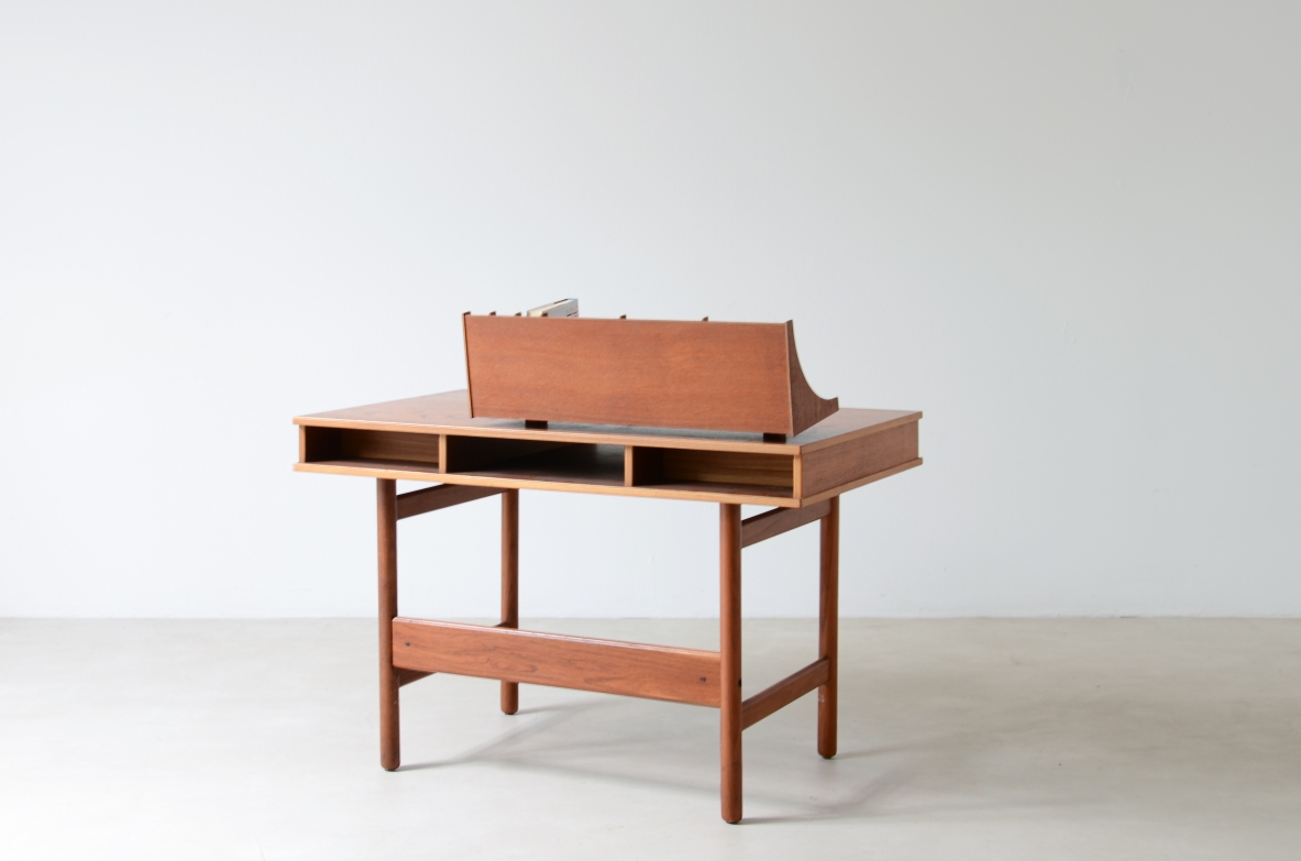 Small central desk with two drawers on the front, and open compartment  Italian manufacture, ca. 1960.