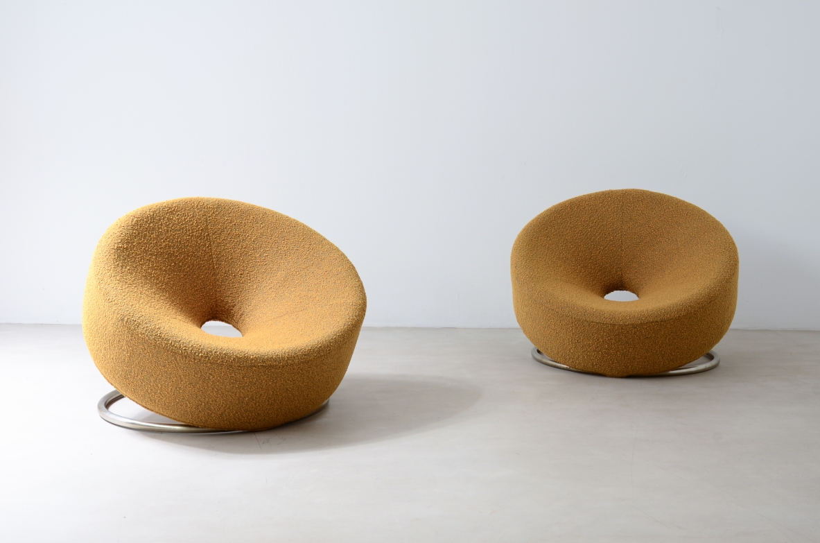 Pair of donut armchairs with steel base and fabric covering.  Italian manufacture from the 70s