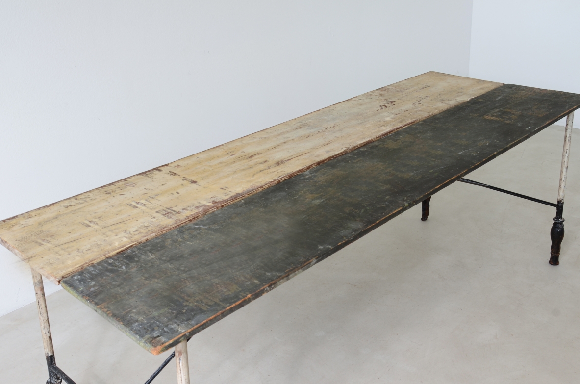 Table with iron base with turned feet and painted wooden top.  Manufacture, France ca. 1920/30.