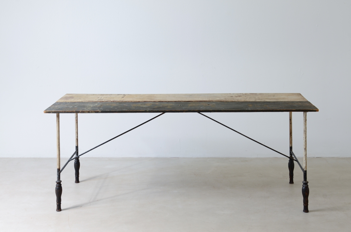 Table with iron base with turned feet and painted wooden top.  Manufacture, France ca. 1920/30.