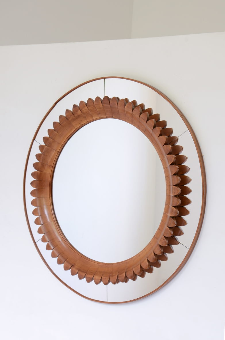 Pier Luigi Colli  Large "Margherita" mirror with flower-shaped petals carved in cherry, ground and shaped powder-colored glass and central mirror. 1940