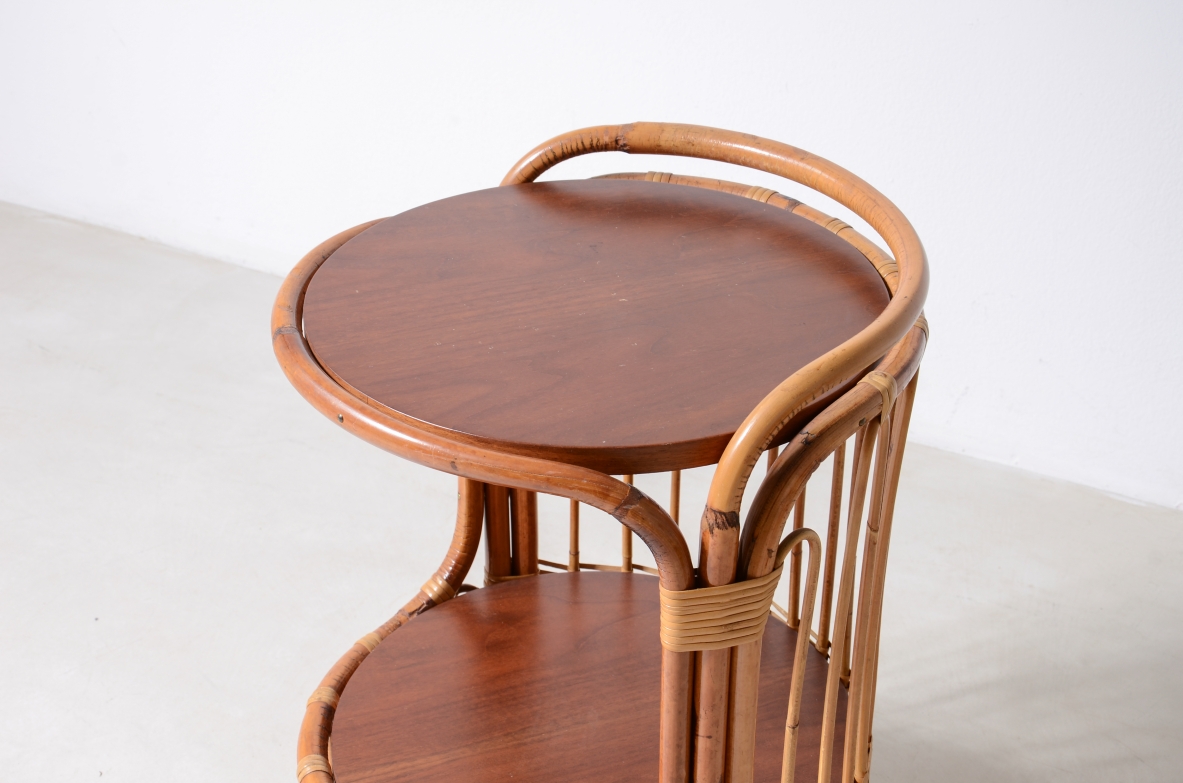 Pair of rattan nightstands with two wooden shelves.Italian manufacture 1960's