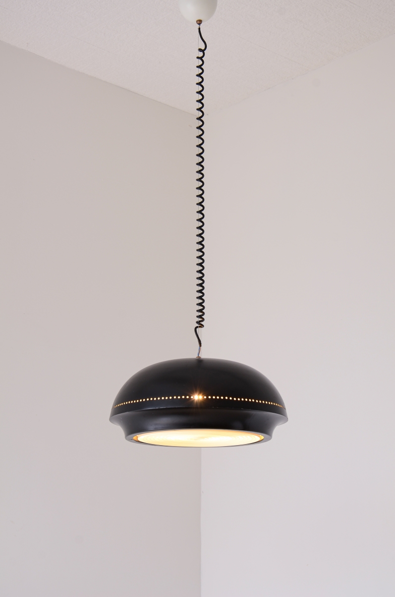 Rare early pendant lamp by Afra and Tobia Scarpa for Flos, featuring a black lacquered metal dome shade, perforated decorative band and white spiral suspension cable.