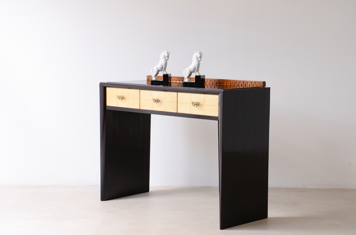 ABV Borsani Varedo  Elegant stained oak console table with carved wood motif