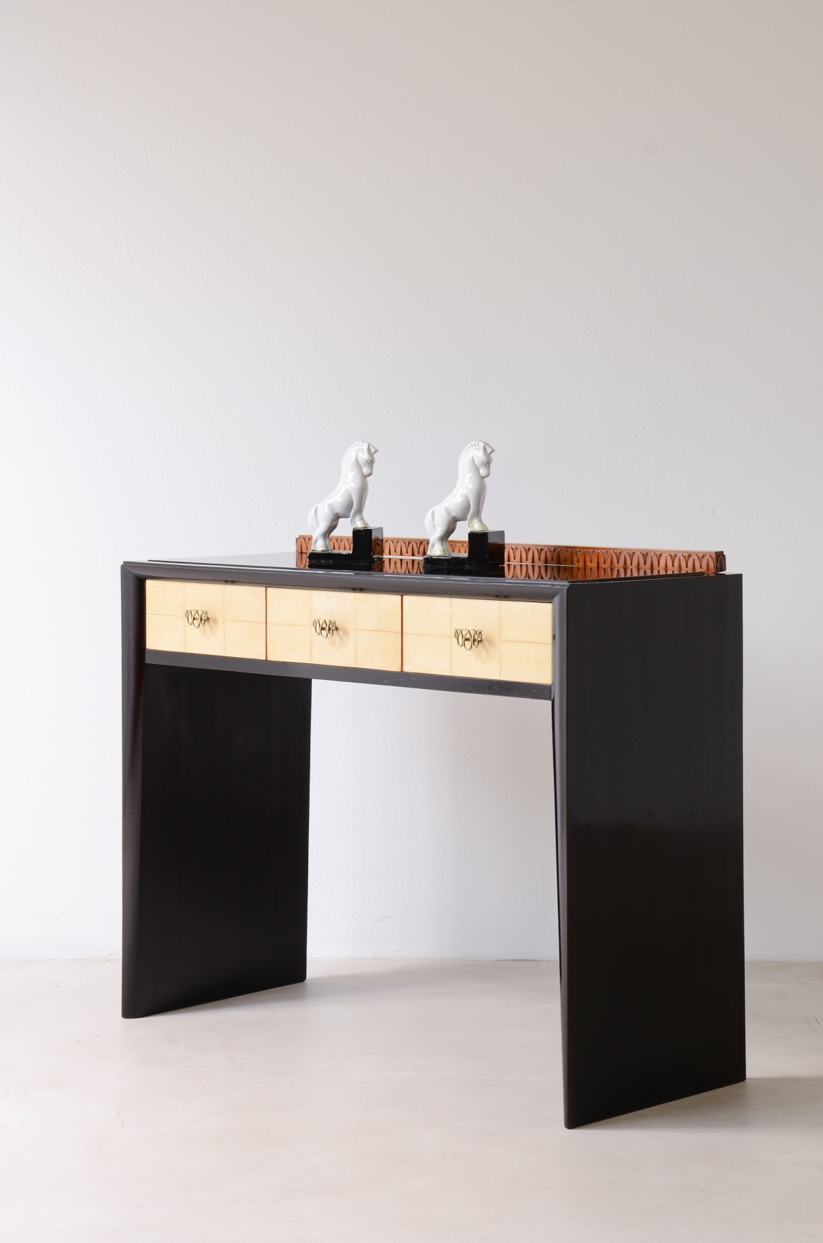 ABV Borsani Varedo  Elegant stained oak console table with carved wood motif