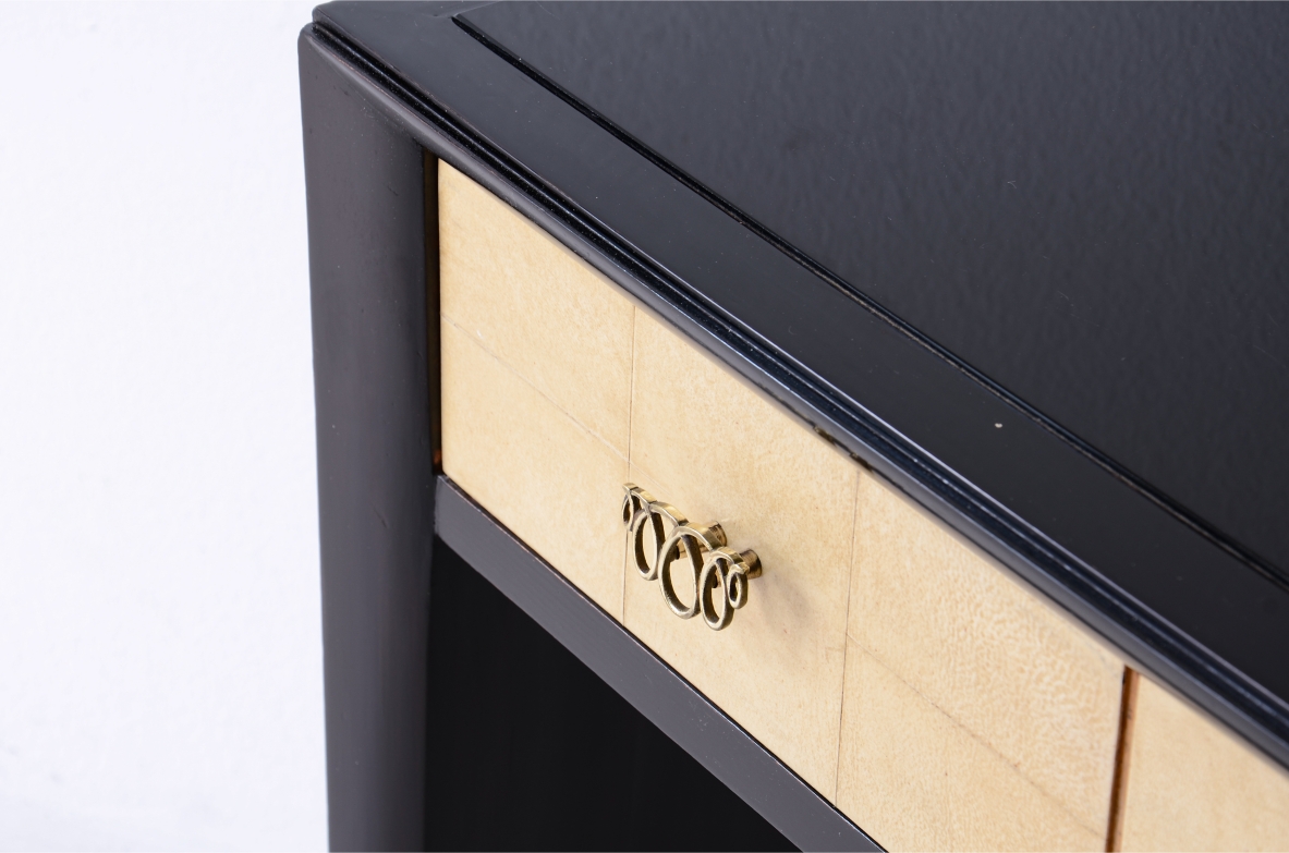 ABV Borsani Varedo  Elegant stained oak console table with carved wood motif