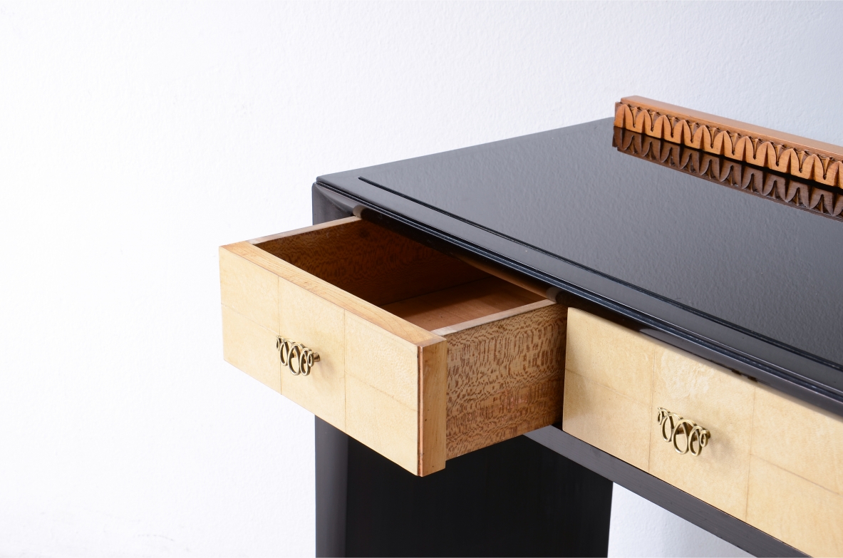 ABV Borsani Varedo  Elegant stained oak console table with carved wood motif