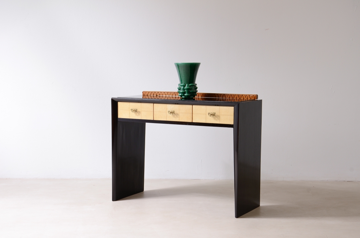 ABV Borsani Varedo  Elegant stained oak console table with carved wood motif