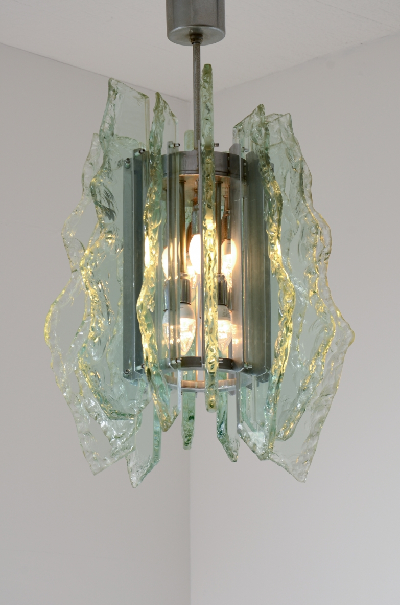 Gino Paroldo pendant chandelier for Fontana Arte, featuring large sculptural vertical panels of thick Nile green textured glass arranged radially around a central metal frame.