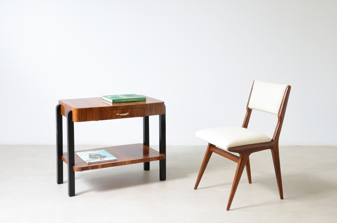 Walnut and stained wood coffee table with two shelves. Made in the 1930s.