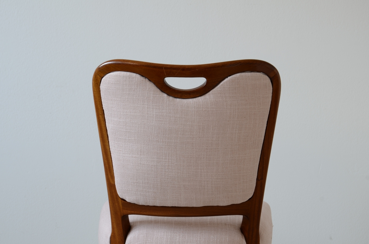 Osvaldo Borsani. Set of 10 elegant shaped walnut chairs. ABV Borsani, Varedo, ca. 1945.
