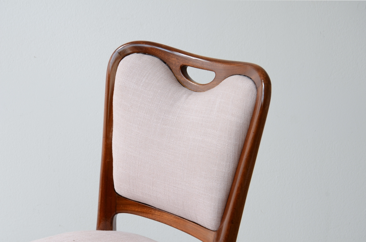 Osvaldo Borsani. Set of 10 elegant shaped walnut chairs. ABV Borsani, Varedo, ca. 1945.