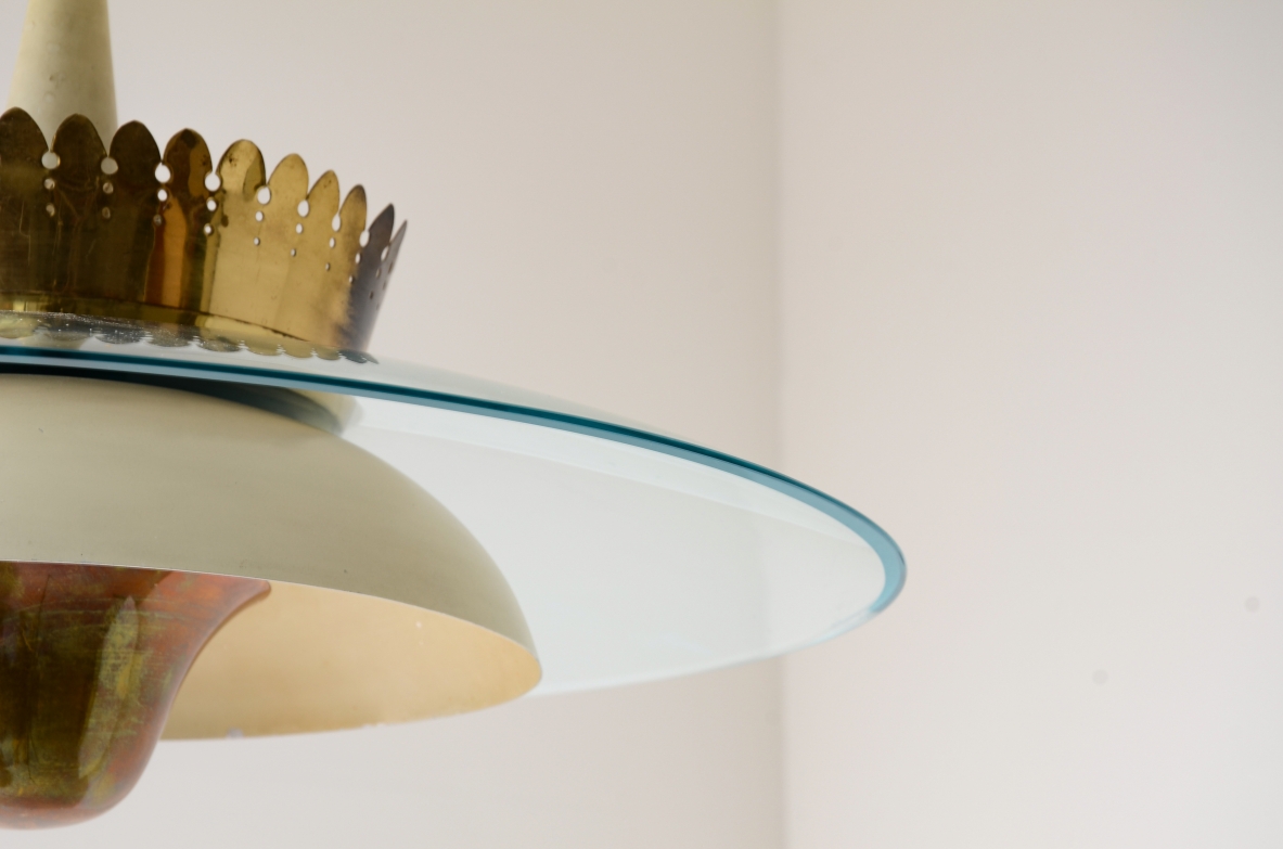 Splendid chandelier with a large curved glass bell and metal bowl 