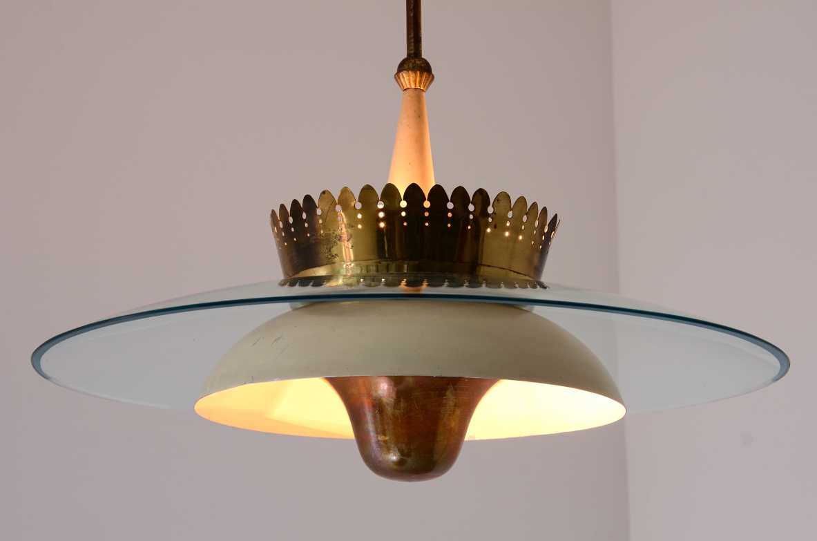 Splendid chandelier with a large curved glass bell and metal bowl 