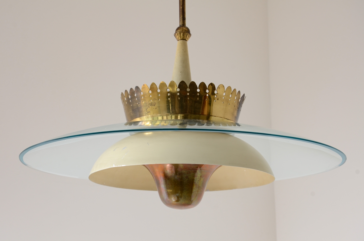 Splendid chandelier with a large curved glass bell and metal bowl 