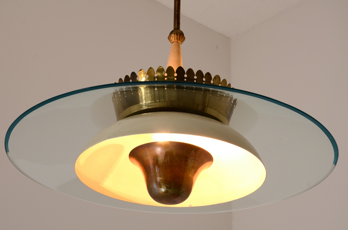 Splendid chandelier with a large curved glass bell and metal bowl 